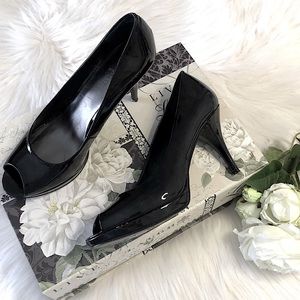 NINE WEST “Tristano” Peep Toe Platform Pumps